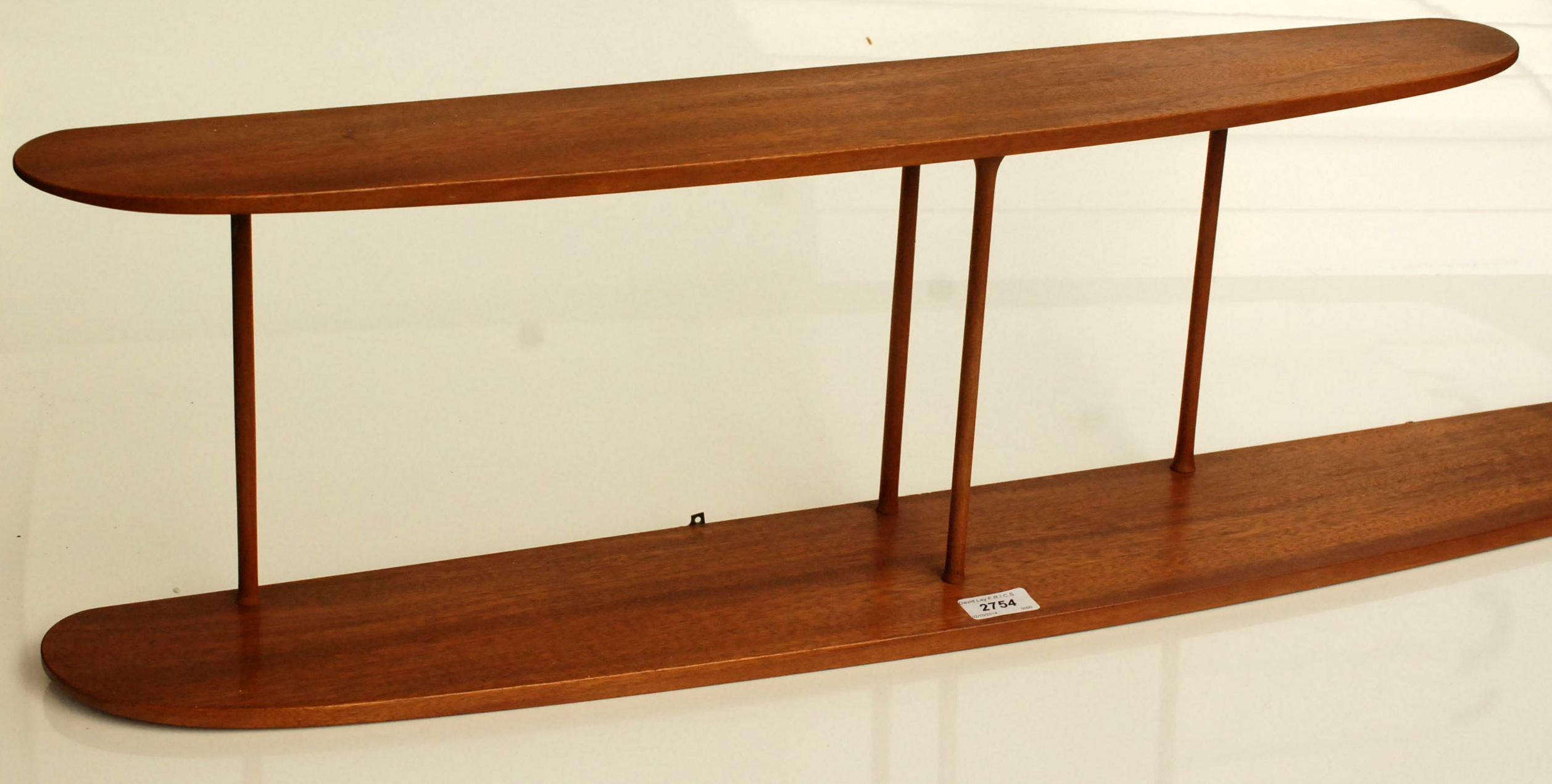 A Robin Nance biplane open shelf, impressed mark Nance Workshops, St Ives, length 145cm.