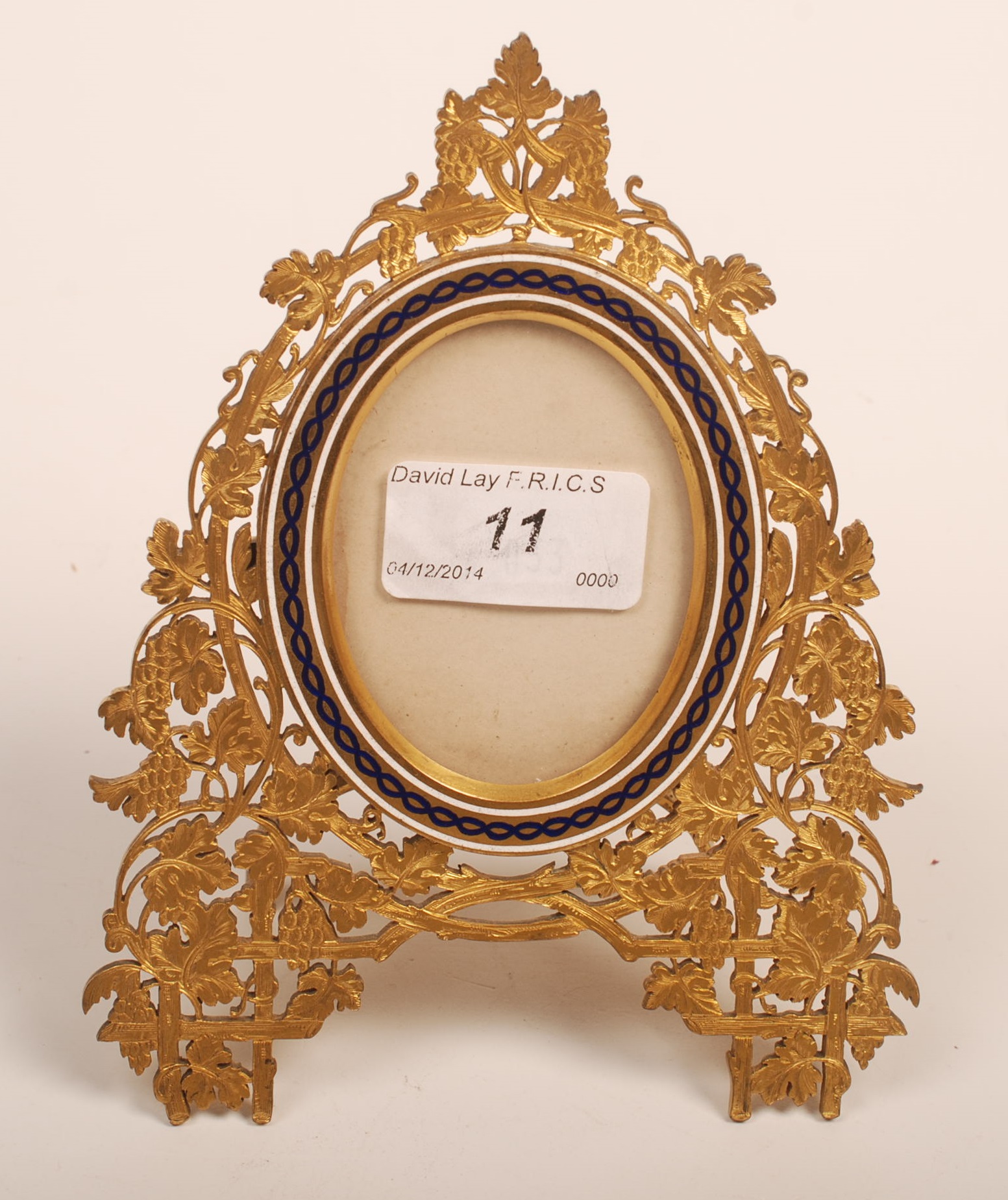 A fine mid 19th century English easel miniature frame with a blue and white enamel oval band