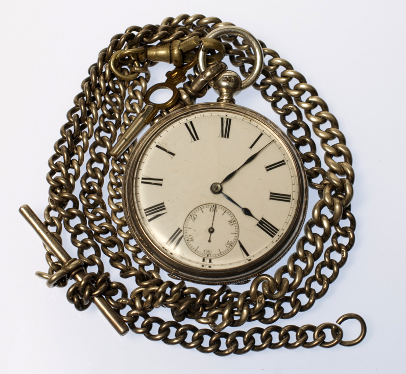 A silver cased open faced key wind pocket watch and two silver watch chains.