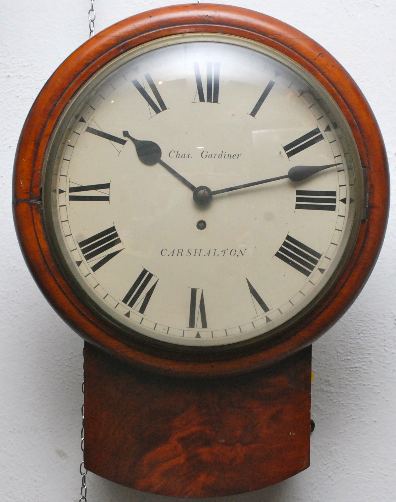 A 19th century mahogany drop case wall clock by Chas Gardiner, Carshalton, with fusee movement.
