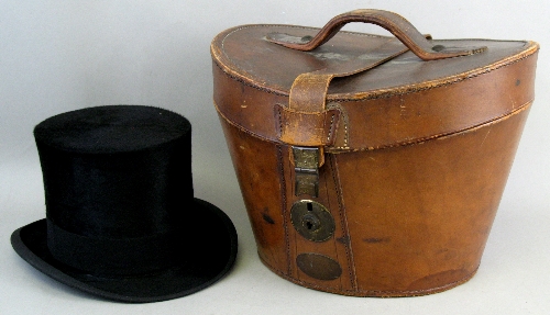 A top hat by Christys` London, in calf leather carrying case