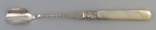 A Victorian stilton scoop, with tapered mother of pearl haft and leaf cast ferrule, 27.5cm long