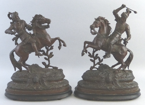 After Doriot, a pair of Victorian spelter figures of medieval style warriors on horseback, fitted