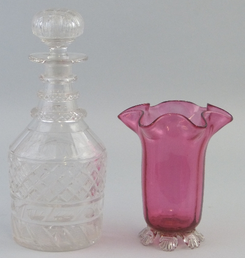 A 19th Century clear glass decanter, of mallet shaped form with ringed neck, deep cut body, slice