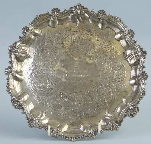 A George IV presentation waiter, of circular form, the centre with crest and inscribed “In Memory of