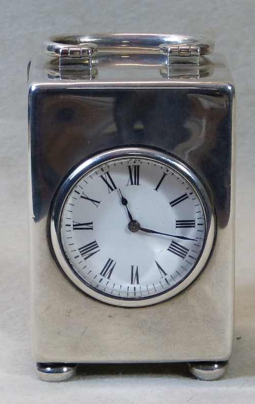 A late Victorian carriage clock, the French movement having white enamel circular dial with Roman