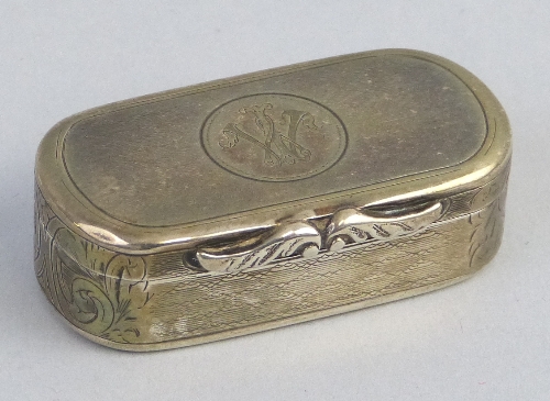 A Victorian snuff box, of rounded oblong form, the hinged lid with monogrammed cartouche on an