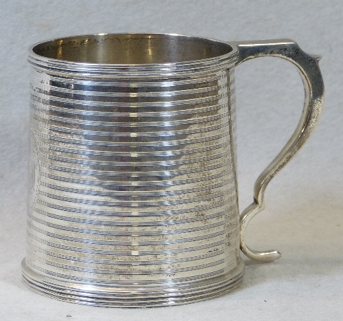A Victorian Christening mug, of tapering cylindrical form with flattened scroll loop handle,