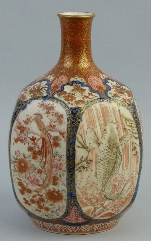 A late 19th Century Japanese Kutani vase, of bulbous hexagonal form with narrow neck painted with