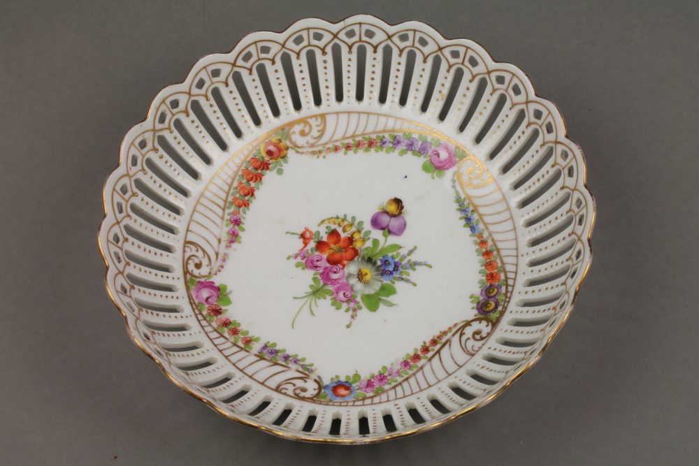 A Dresden deep bowl with pierced rim and central floral spray 8