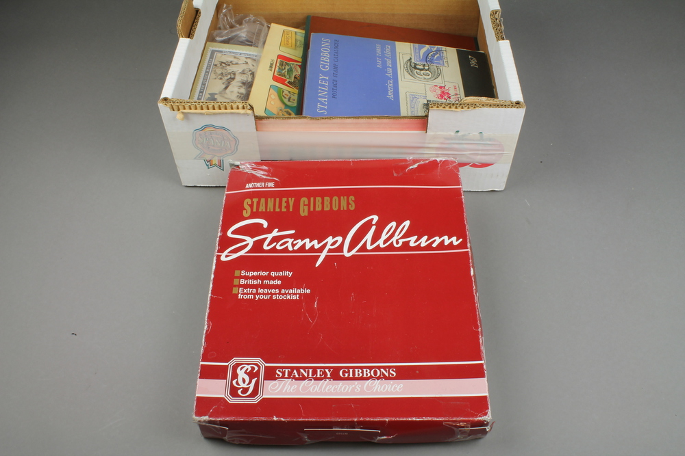 A Stanley Gibbons stamp album, a Senator medium, Royal Mail 1987 special stamp album, a 1967