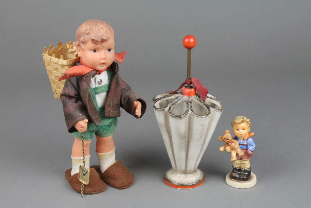 A Goebels vase in the form of an umbrella VX60 7"", a Hummel figure Christmas gift 3 1/2"" and a