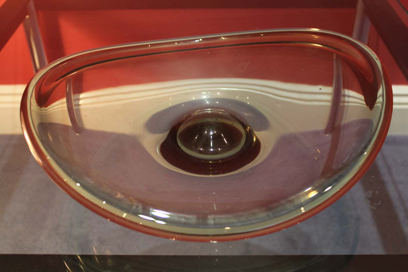 A GLASS BOWL, 34cm x 32cm, signed indistinctly.