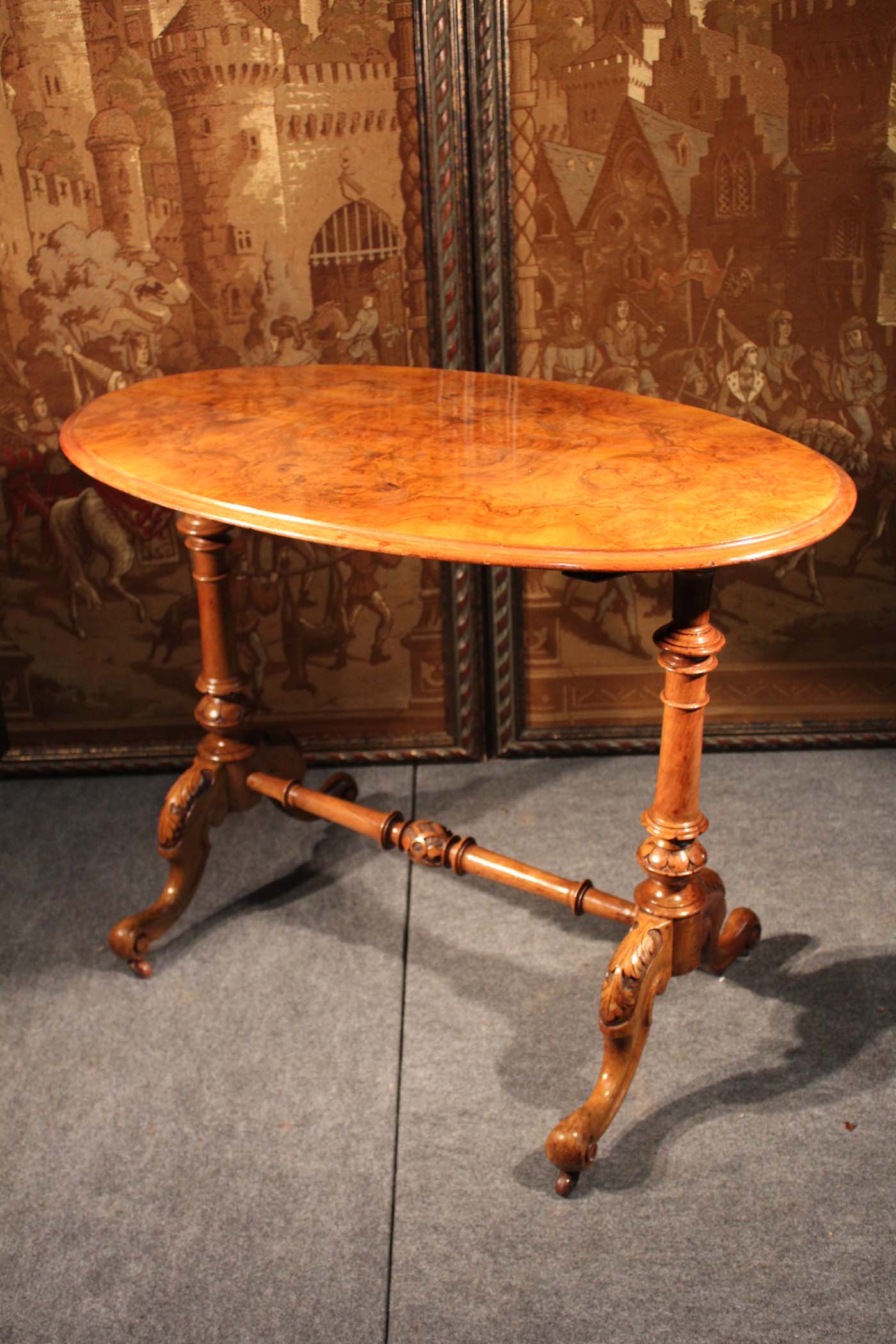 A WALNUT OCCASIONAL TABLE, 19th Century, on turned supports, 90cm wide x 56cm deep x 69cm high
