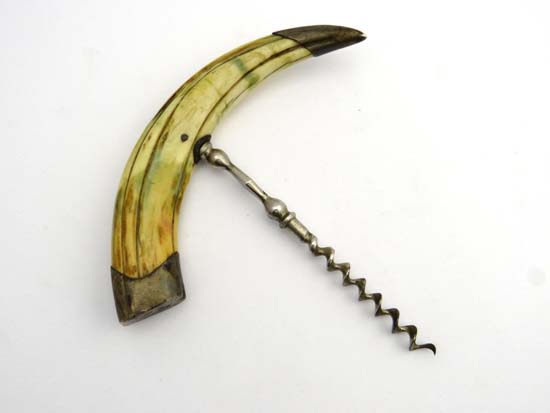 Taxidermy : An early 20thC Boar's Tusk white metal ended Cork Screw, engraved with a monogram to one