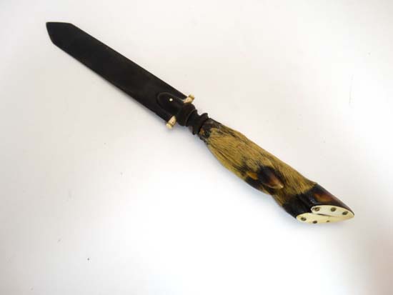 Taxidermy : A chamois foot handled and Horn bladed letter knife . 11 1/2" long   CONDITION: