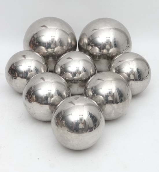 Garden and Architectural: at set of 8 ( 6+2) Stainless steel spheres . Two large at approximately