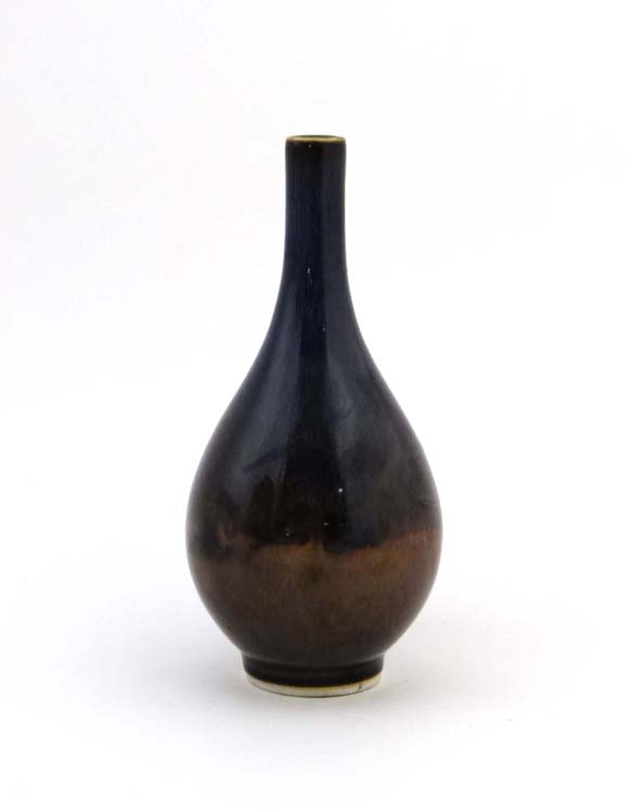 Oriental signed Studio Vase : A signed small bottle shaped vase (studio pottery) with high fired two