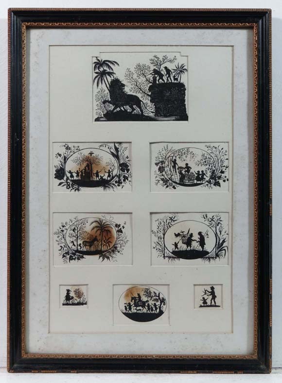 Silhouettes
A glazed and framed set of 6 printed monochrome silhouettes with the subjects ; lion