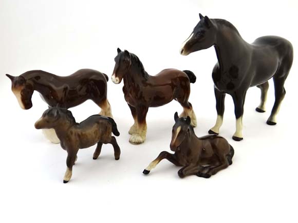 Two Beswick Horse figures comprising Lying Foal , model number 915 ( produced 1941-1989 ) and