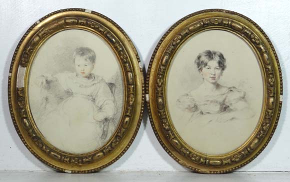 Early-Mid XIX English Portrait School
Pencil and Conte, pair of ovals
A young girl wearing a dress