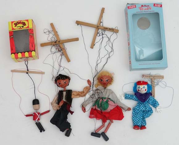 Pelham Puppets : four wooden hand puppets , to include clown (boxed) , soldier (boxed) together with