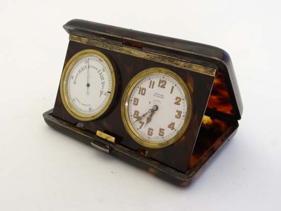 A rare 8-Day Travel Compendium Clock and Barometer within a folding faux blonde tortoiseshell