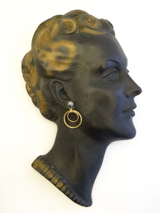 A 1950's painted plaster wall mask formed as a female head 12" high    CONDITION:  Please Note -  we