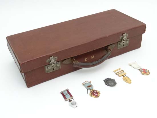 Masonic regalia : A leather case opening to reveal 5 Masonic jewels by Spencer and Toyy & co.