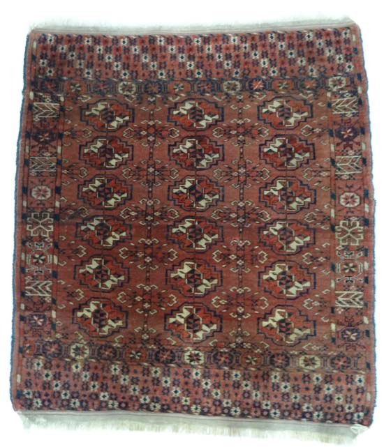 Rug Carpet : An finely knotted antique Saryk Turkoman panel rug , the madder field with 6 rows of