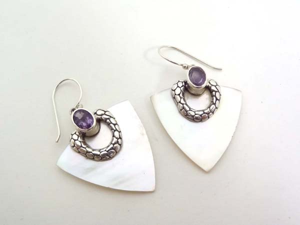 A pair of silver and mother of pearl drop earrings set with amethysts
