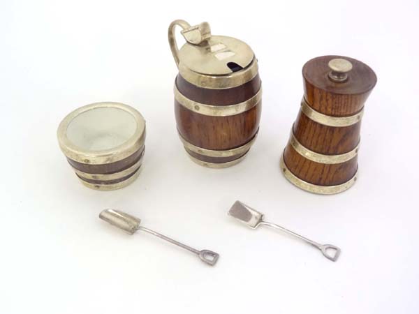 A 3 piece novelty cruet set formed as wooden barrels with silver plate coppered decoration