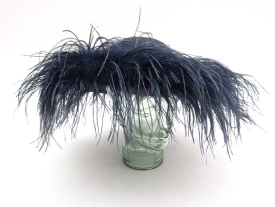 Designer Hat / Millinery : a boxed Navy raw silk hat with navy ostrich feather trim to brim.
