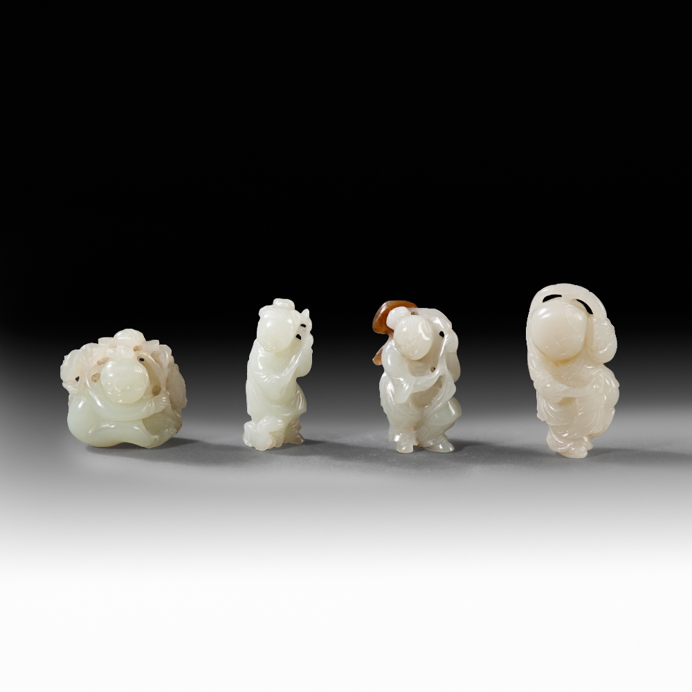 A GROUP OF FOUR WHITE JADE BOYS, 18TH/19TH  CENTURY. H: 5.8 cm, H 4.9 cm,
H: 4.8 cm, H: 4 cm.