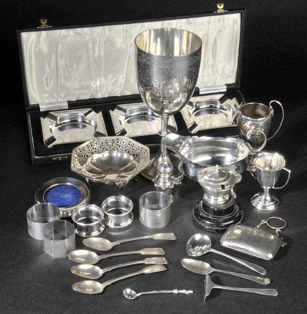 *  A mixed collection of silver including a trophy cup, London 1879, 21cm high (approx. 7.5oz), a