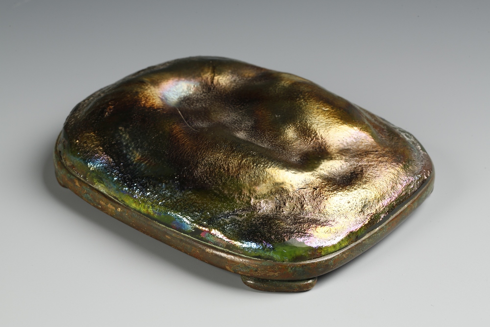 TIFFANY STUDIOS, NEW YORK: A FAVRILLE OPALESCENT GLASS PAPERWEIGHT of irregular rectangular form,