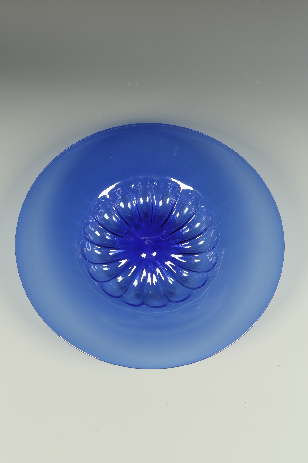 A VENETIAN BLUE GLASS BASIN with a broad circular rim and lobed body, 16.5"" wide