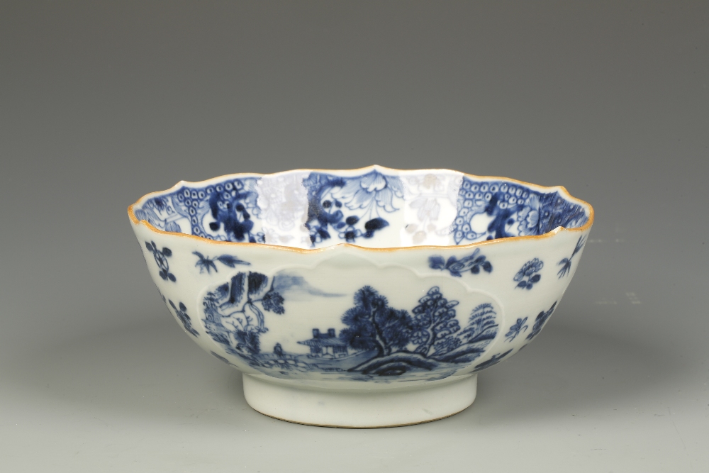 A CHINESE EXPORT BLUE AND WHITE BOWL with an ogee rim, the exterior with moulded panels decorated