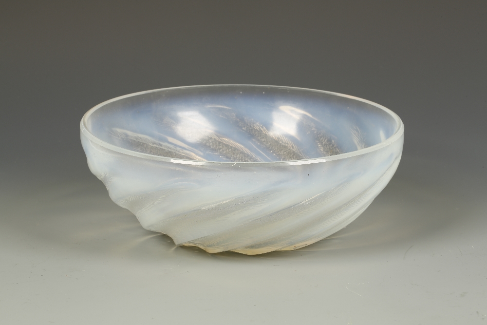 LALIQUE: POISSONS NO. 2: A GLASS BOWL decorated with radiating fish, with etched mark ""R. Lalique,