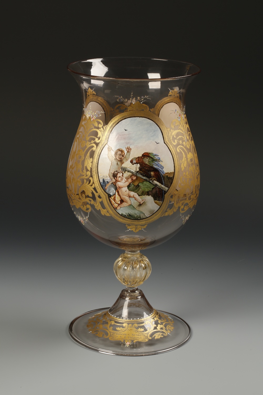 A LARGE "FACON DE VENISE" STYLE GOBLET, the broad bellied bowl decorated with scenes of cavorting