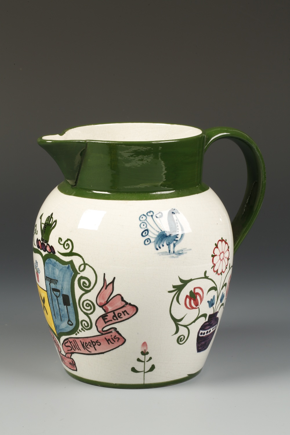 A WEMYSS "GARDENING" JUG with painted floral and bird decoration and a central motto "Who loves