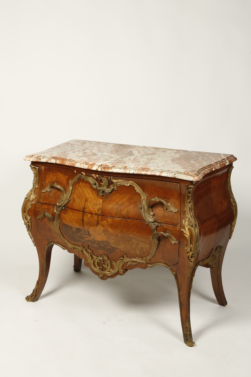A LOUIS XV KINGWOOD AND MARQUETRY COMMODE with a serpentine fronted marble top above a bombe and
