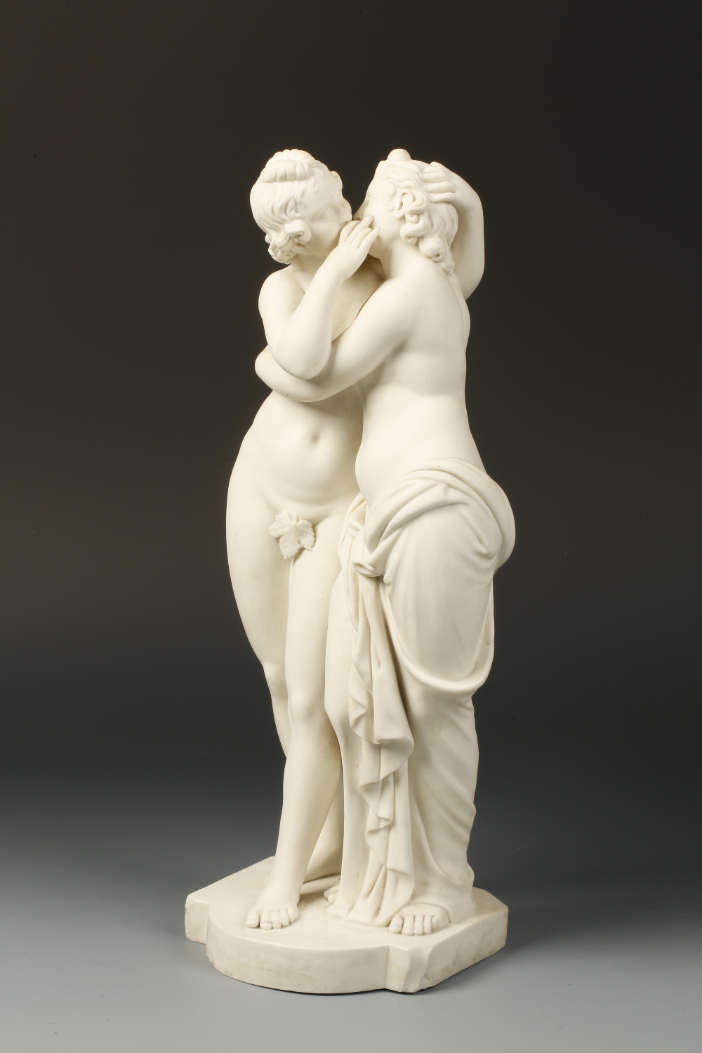 A MINTONS PARIAN WARE GROUP OF CUPID AND PSYCHE KISSING, on a cartouche-shaped base, inscribed "From