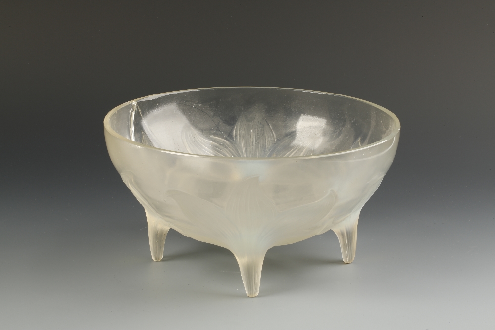 LALIQUE: "LYS" a bowl decorated with four moulded flowerheads, the centres forming short legs,