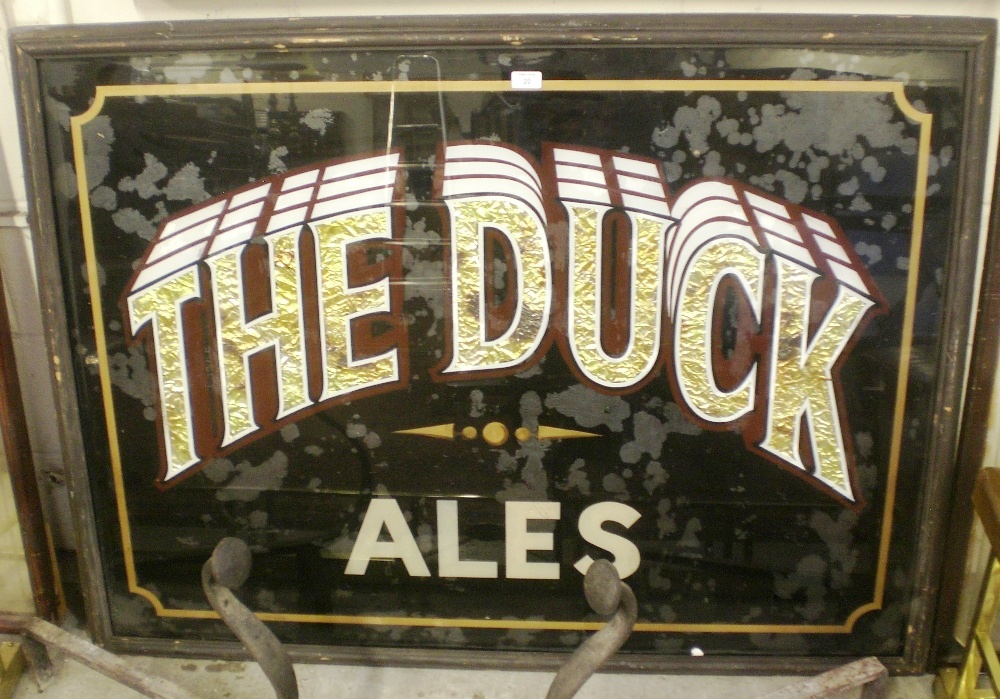 A Victorian pub glass panel, `The Duck Ales` with gold foil-backed letters