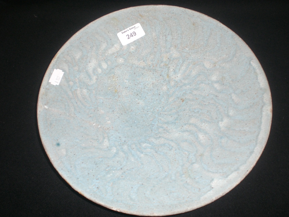 A Peter Beard blue pottery dish with all over textured surface