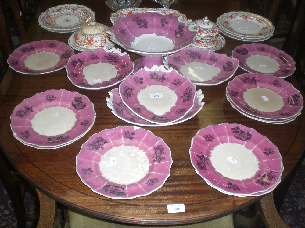 A Victorian dessert service with floral decoration and a similar part service