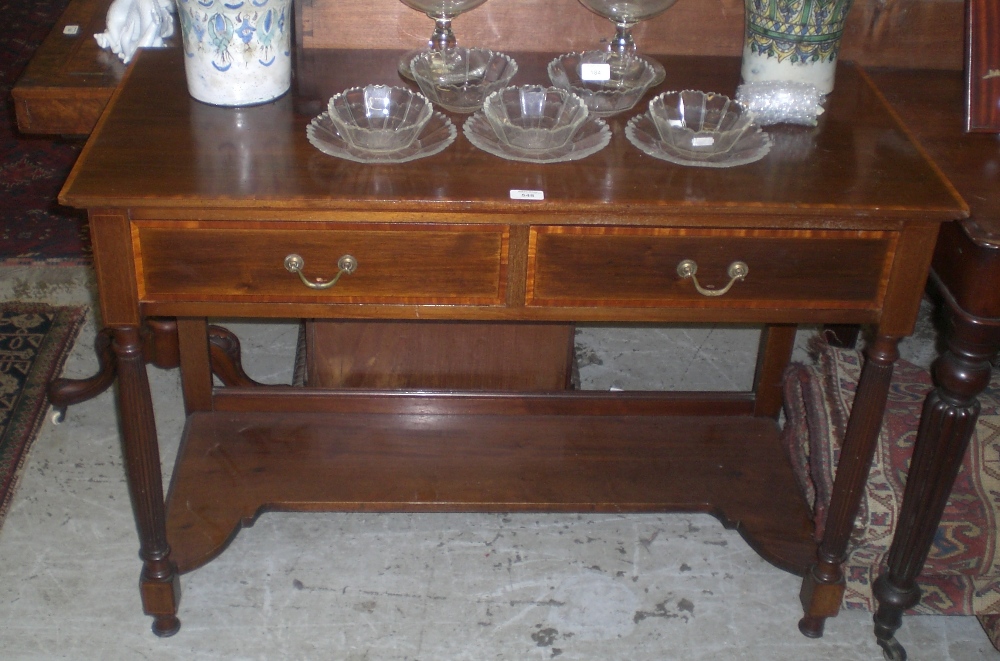 An Edwardian satinwood crossbanded side table fitted two drawers