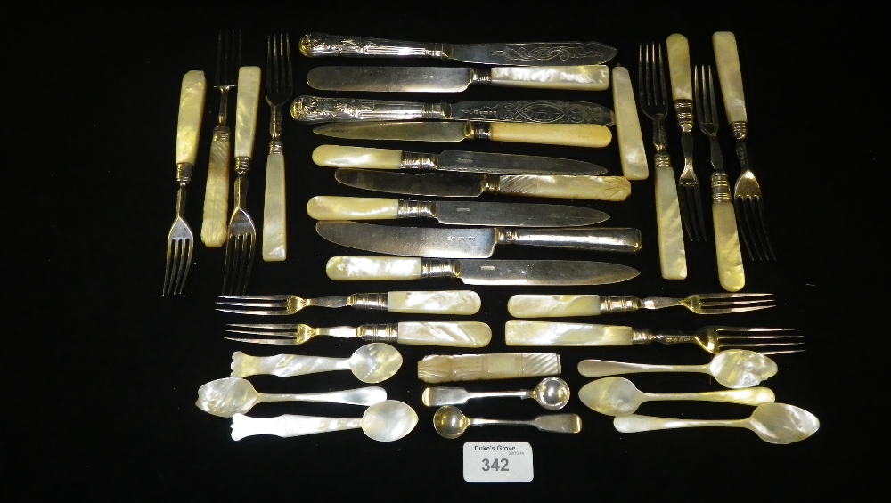A large quantity of mother-of-pearl handled dessert knives and forks