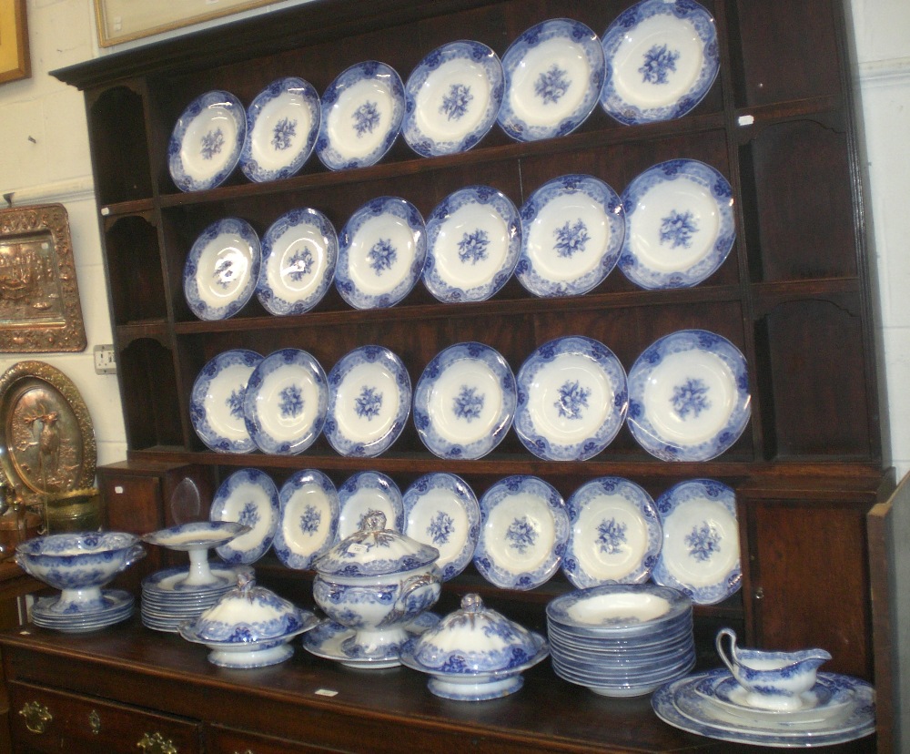 A large quantity of 19th century `Flow Blue` dinner service including tureens